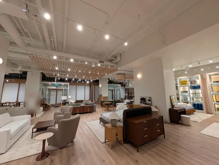 Furniture showroom with pendant speakers and dome cameras