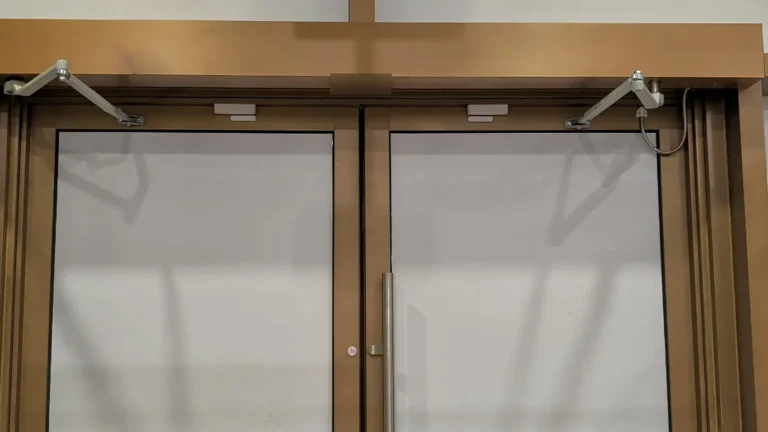 Double entrance doors with alarm door contacts on the frame